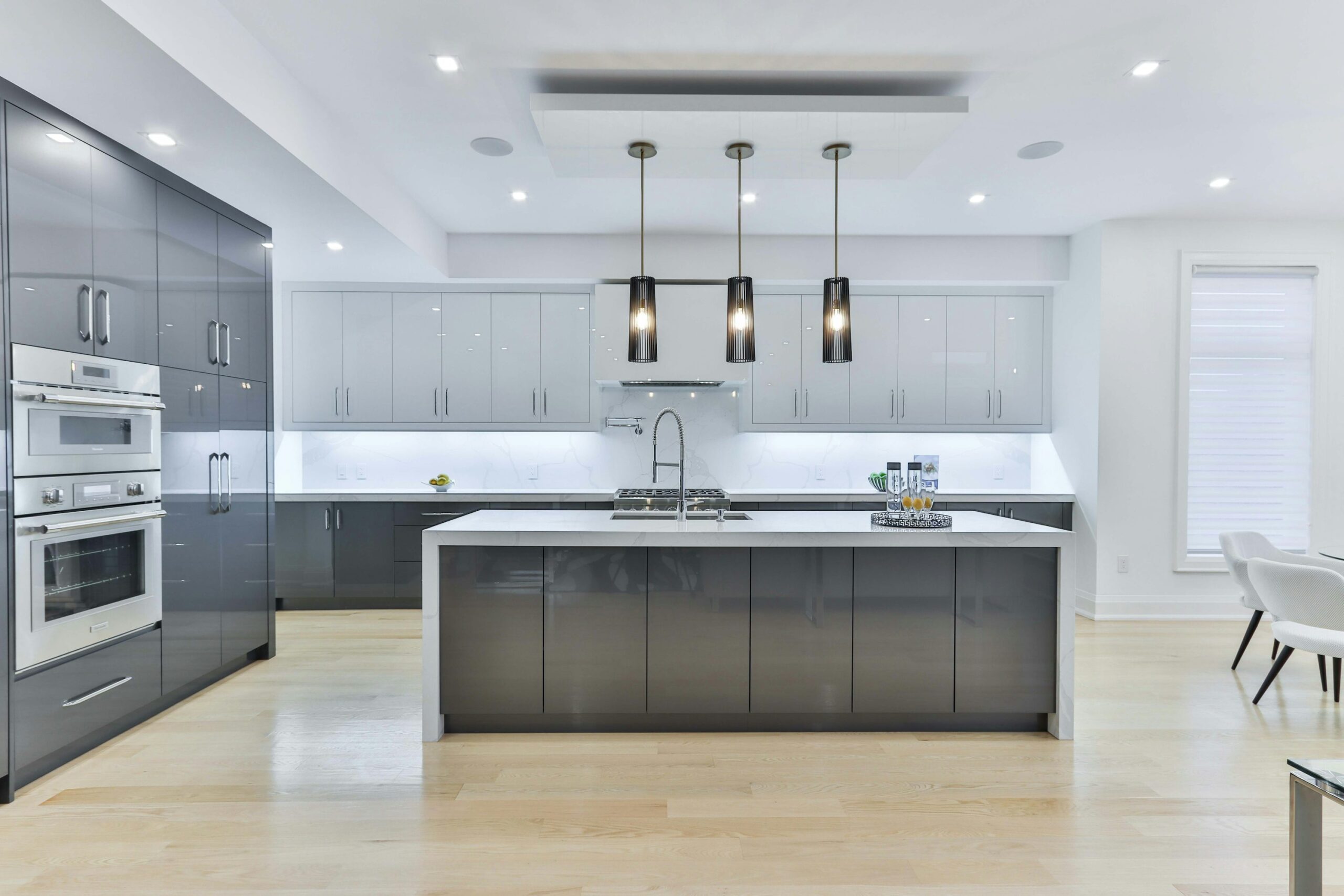 How Do Material Choices Impact The Longevity And Performance Of Modern Kitchen Cabinets?