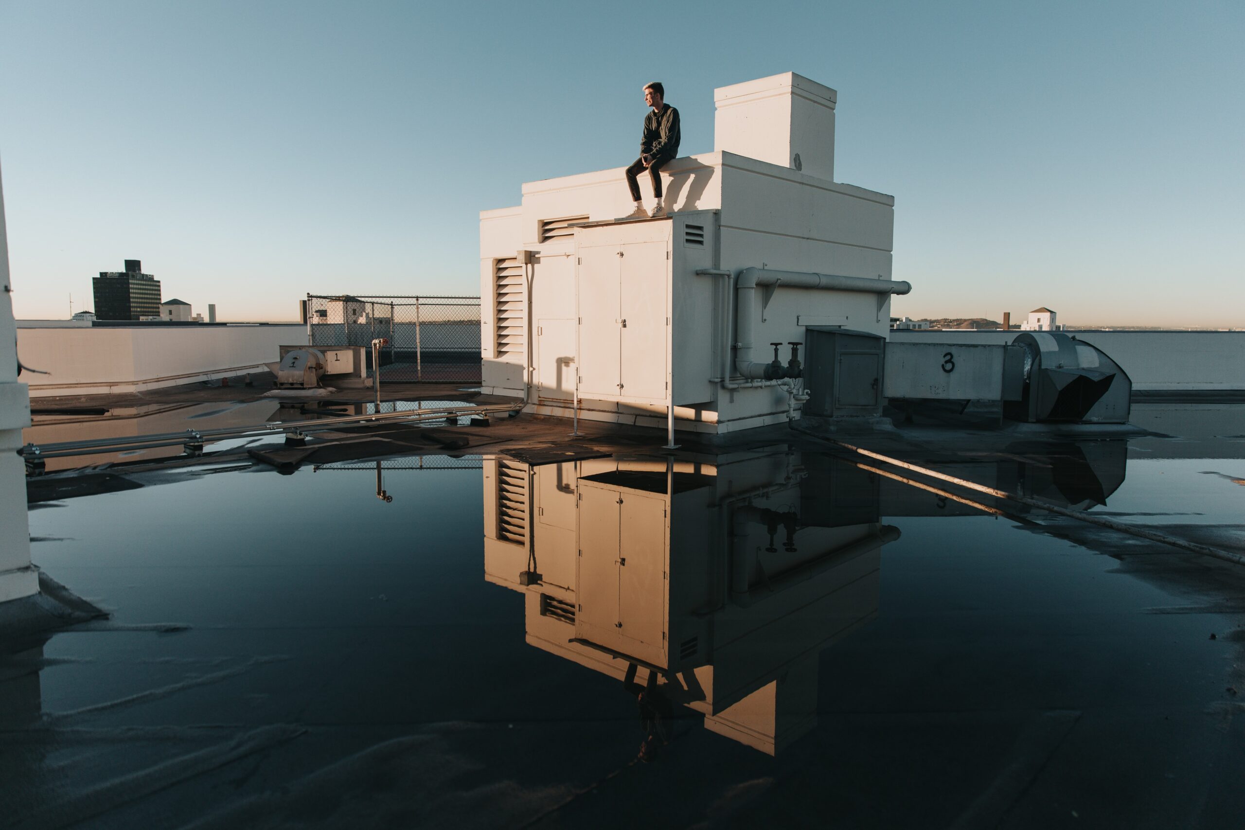 What Impact Does Standing Water Have on Flat Commercial Roofs in Southwest Ranches’ Climate?